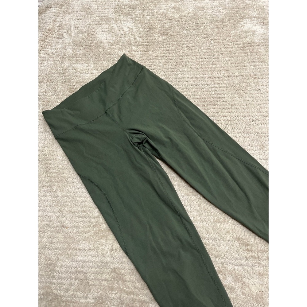 FP Movement High-Rise 7/8 Genesis Legging in an olive green colorway Size medium